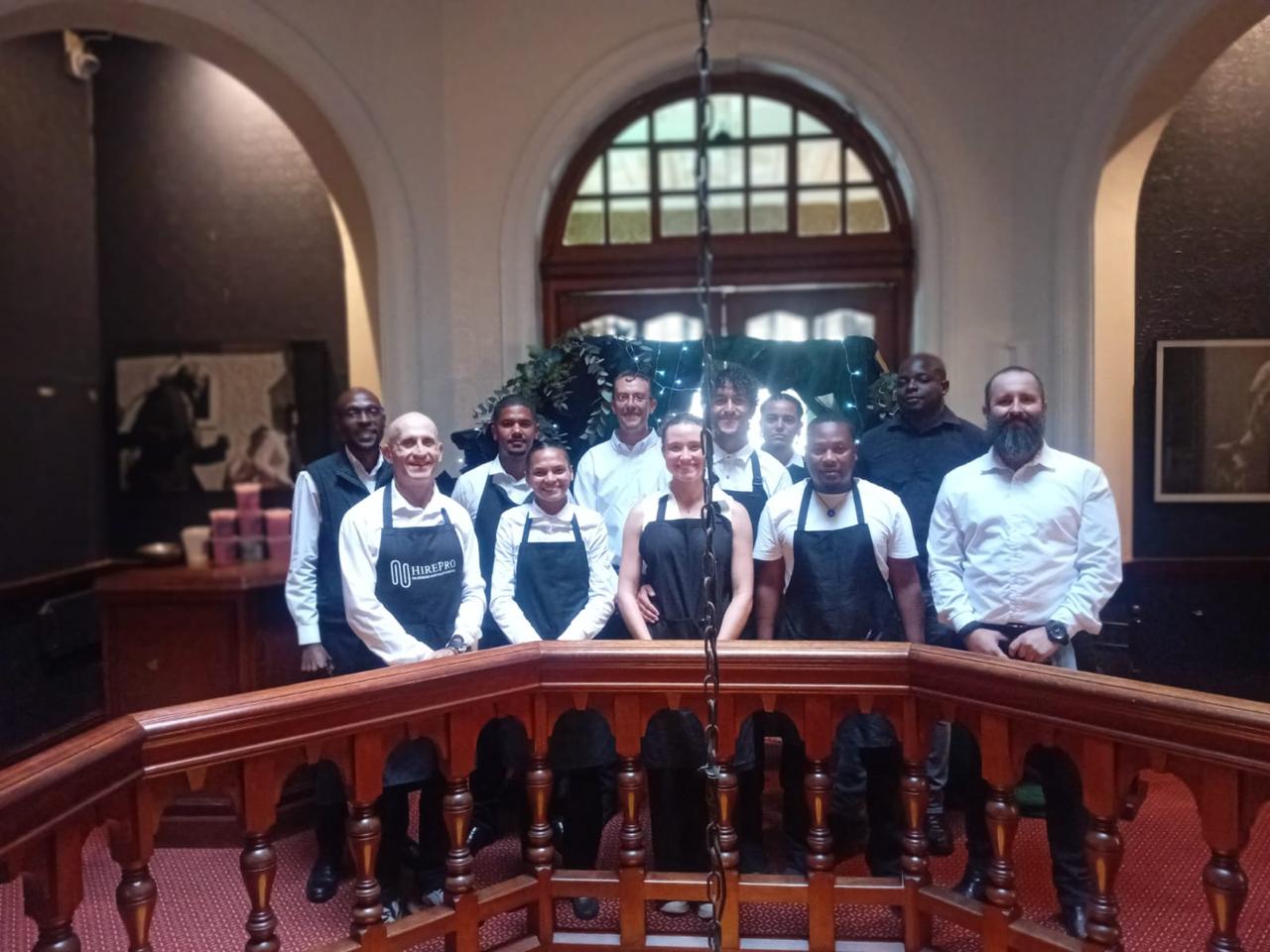 HirePro staff and venue team together after service